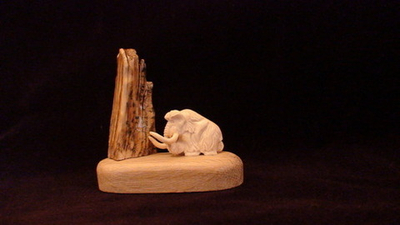 Мамонт у скалы, миниатюра