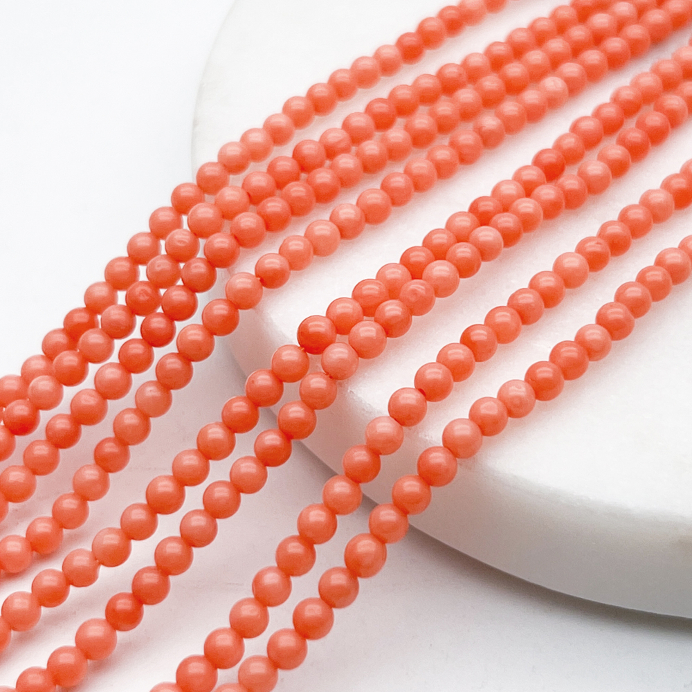 Коралл тонированный шар бусины, размер около 3 мм, цена за отрезок 19 см (1/2 нити)