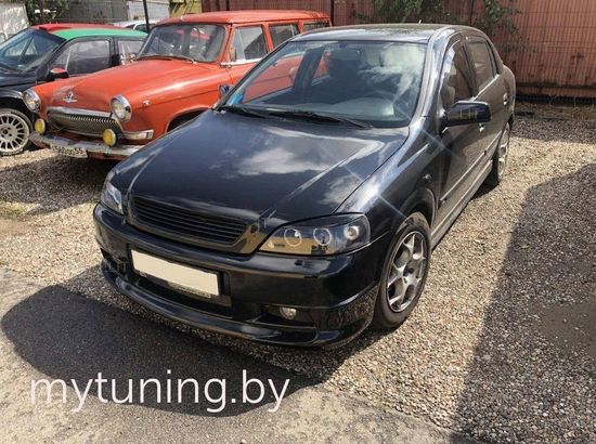 Реснички на фары для Opel Astra G