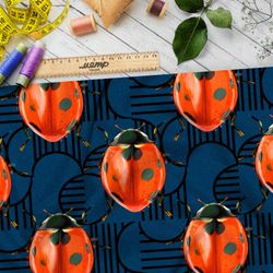 Ткань флис крупный божьи коровки на синем фоне с рисунком