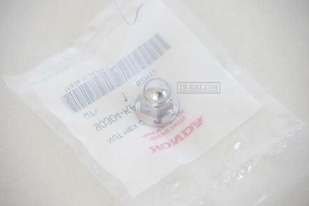 90304-KPH-700. NUT, HEX. CAP, 8MM