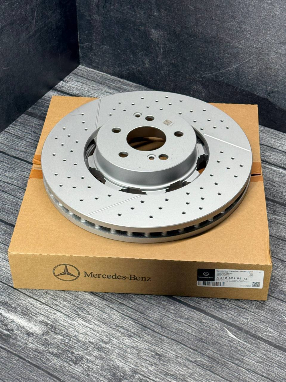 Тормозной диск передний Mercedes-Benz A2124210512