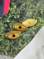 Пуговицы золотистые Скиапар. с эмалью " Зеленый глаз"