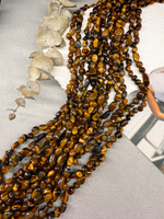 Тигровый глаз галтовка 5-10 мм, нить 39 см