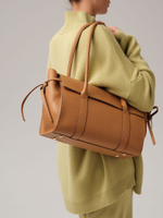 Сумка багет Deboro 31187 оранжевый миндаль