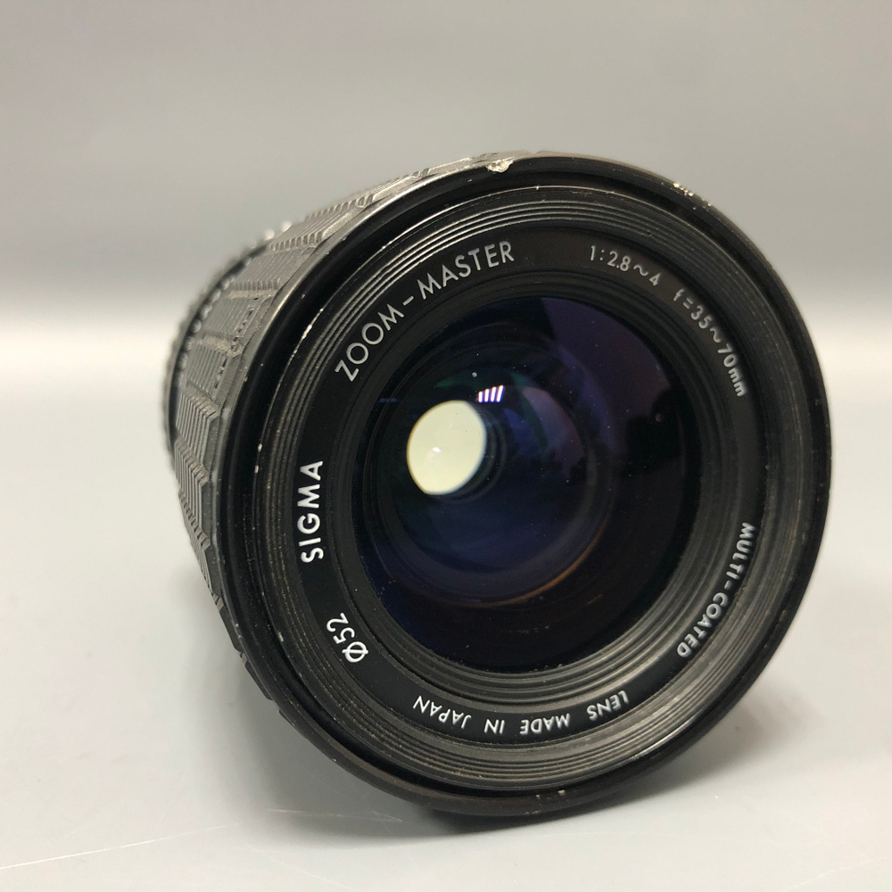 Sigma 35-70mm 2.8-4 M42 со слегка долгой диафрагмой.