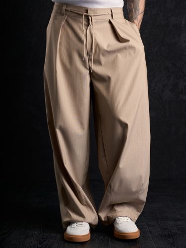 Бежевые брюки 2s1 studio в полоску