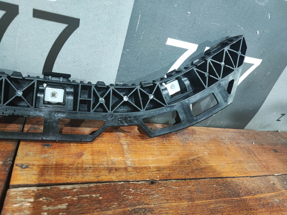 Кронштейн бампера задний правый Kia Rio 3 новый 866144Y500