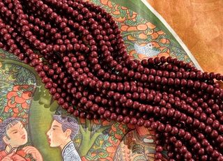 Нить бусин из гематита "Спелая вишня" 6,4мм