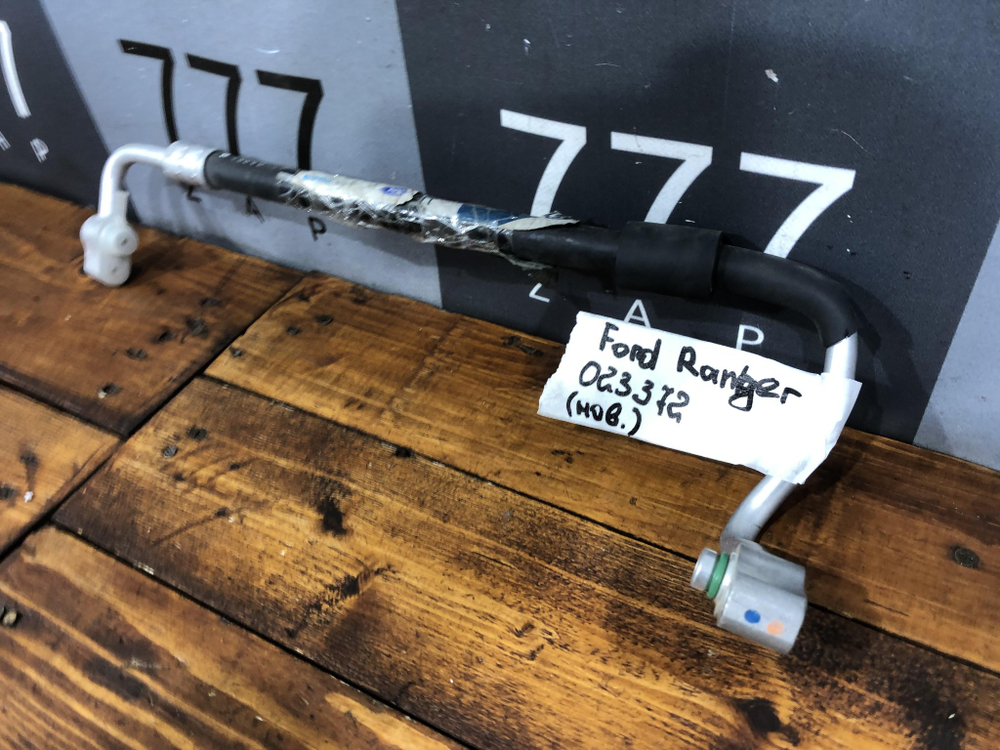 Трубка кондиционера Ranger, B-series 97-06 Новая Оригинал UH7161461A