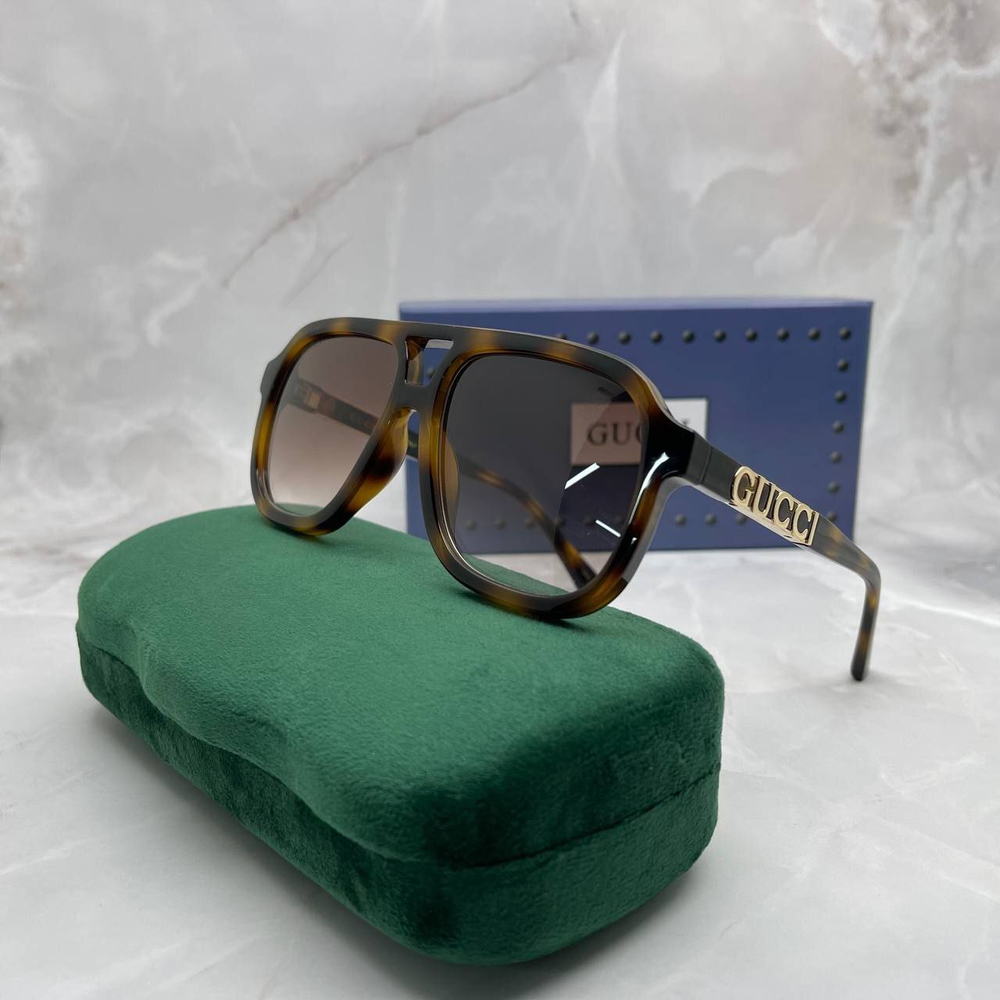 Солнцезащитные очки Gucci