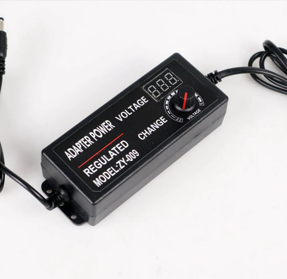 Адаптер регулируемый QiYe-31250 (3-12v/5A) штекер 5.5мм.