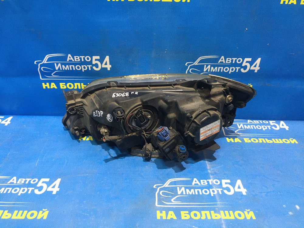 Фара передняя правая MAZDA FAMILIA 2000-2003