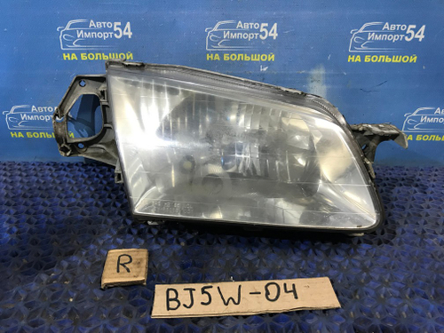 Фара передняя правая MAZDA FAMILIA 1999