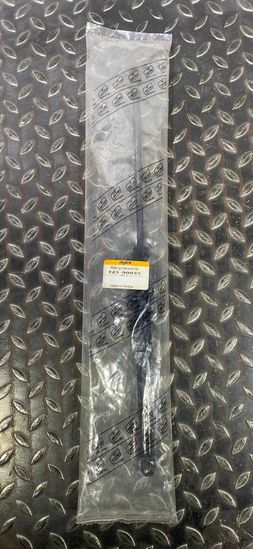 Амортизатор газовый заднего стекла F21/90035