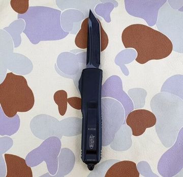 Автоматический нож Microtech MT_233-1T UTX-85 T/E, черн. алюм. рук-ть, черн. клинок