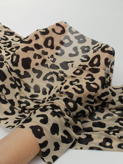 Сетка эластичная бежевая с черным принтом барс метражом