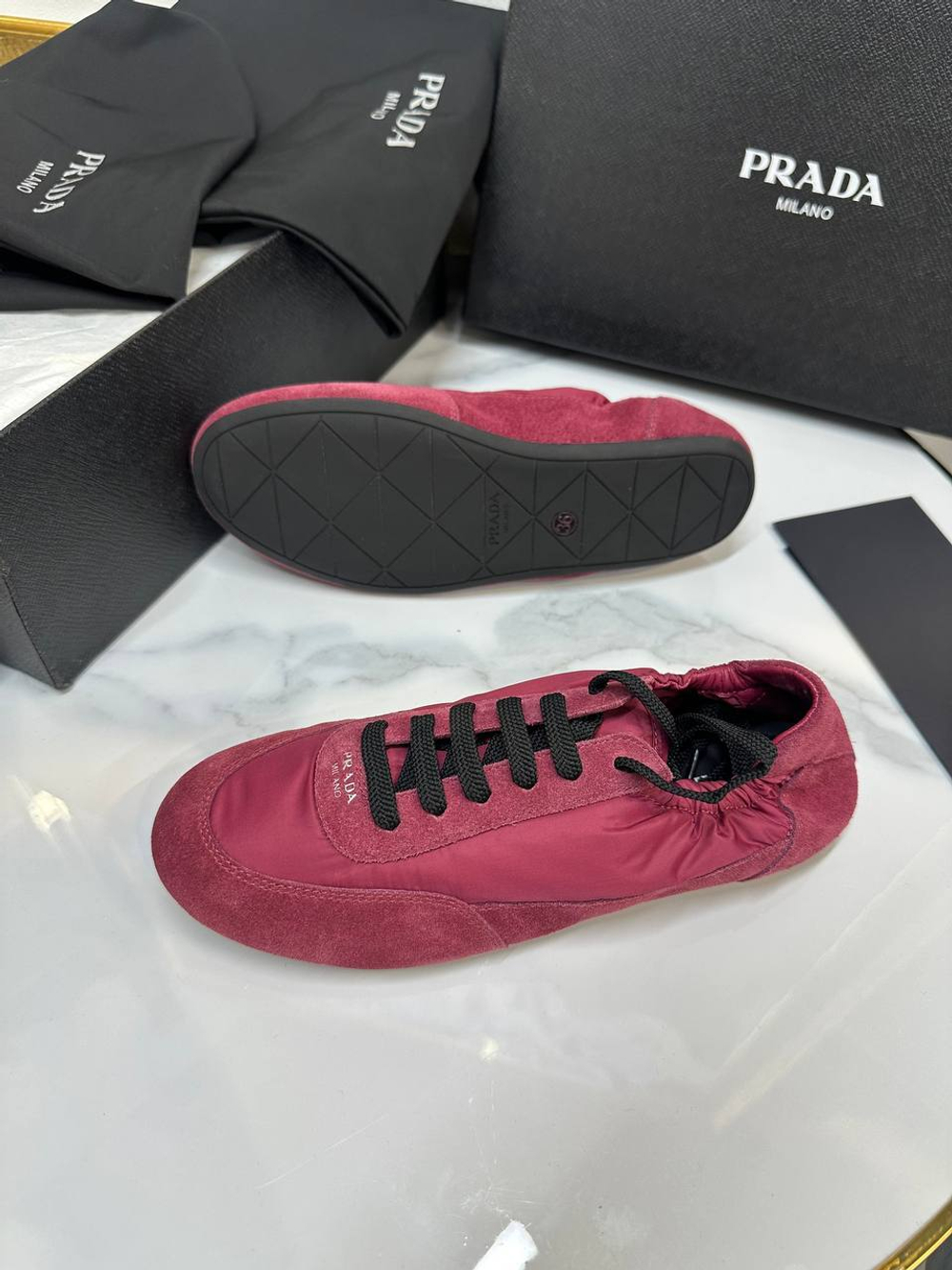 Кроссовки Prada