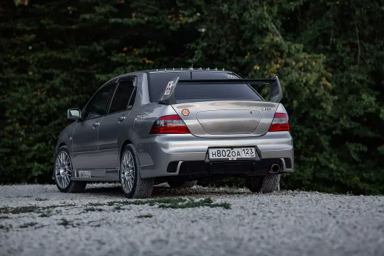 Задний бампер в стиле Evo для Mitsubishi Lancer 9
