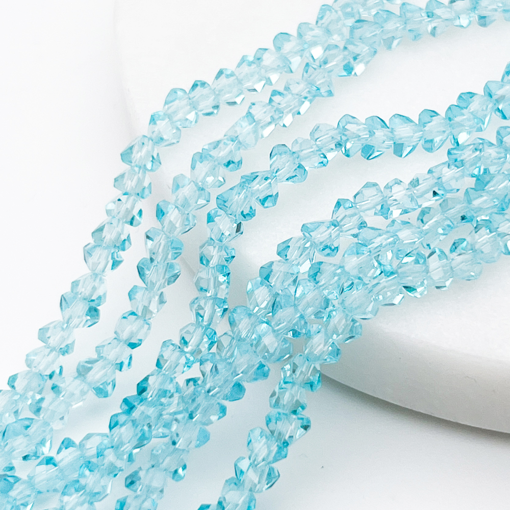 Бусина Треугольник, стекло, цвет голубой, размер около 3,5*4,5 мм, цена за нить 38 см