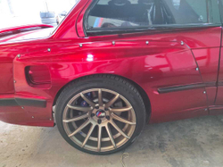 BMW E30 PANDEM (ROCKET BUNNY) Задняя левая накладка (Реплика "Стекловолокно")