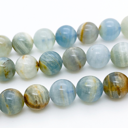 Кальцит голубой бусины, диаметр около 10,1,-10,3 мм, цена за 9 шт (1/4 нити)