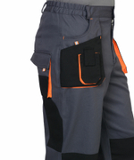 Костюм "СИРИУС-МАНХЕТТЕН" куртка дл., брюки т.серый с оранж. и черным тк. стрейч пл. 250 г/кв.м