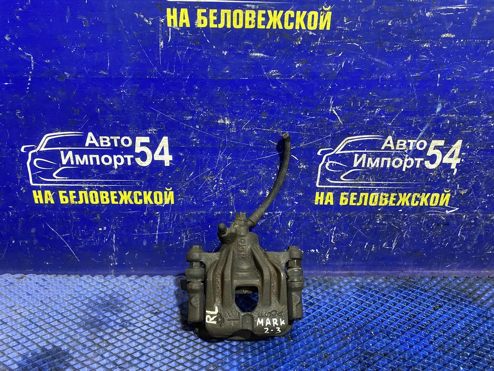 Суппорт тормозной задний левый TOYOTA MARK 2 1999