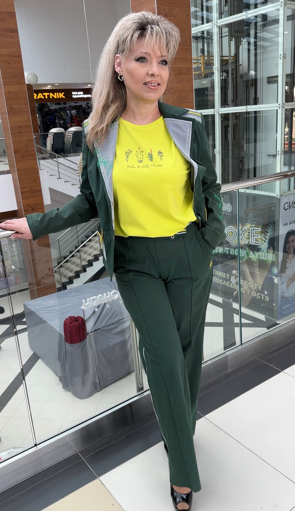 Австрийские брюки-палаццо с лампасами в изумрудном цвете