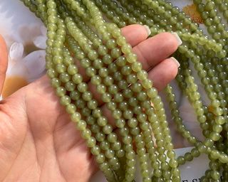 Нить бусин из тонированного кварца 6мм, гладкие