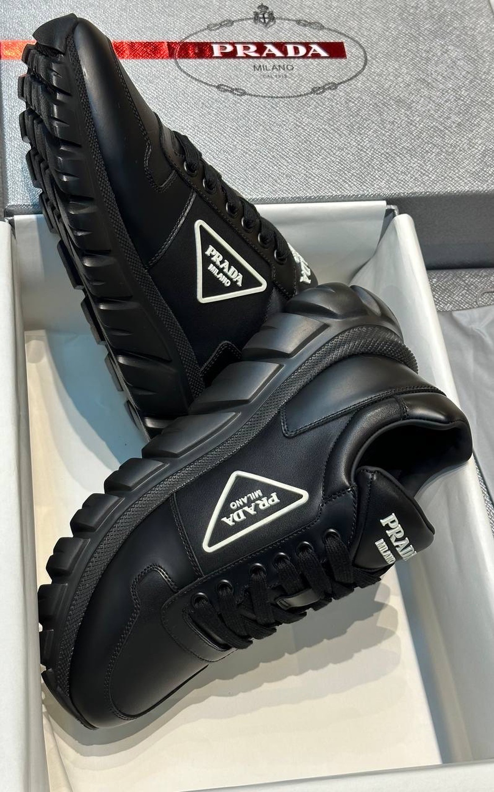 Кроссовки Prada