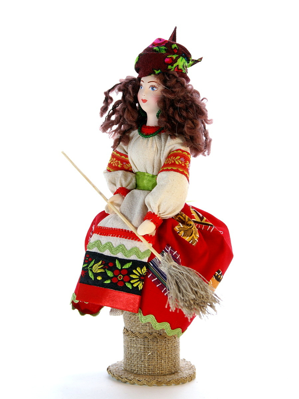 Кукла коллекционная молодая Баба Яга на ступе с помелом.