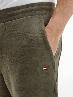 Мужские теннисные штаны Tommy Hilfiger Comfort Capsule Pant - зеленый