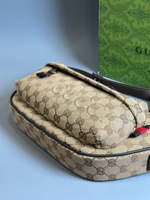 Сумка-слинг Gucci