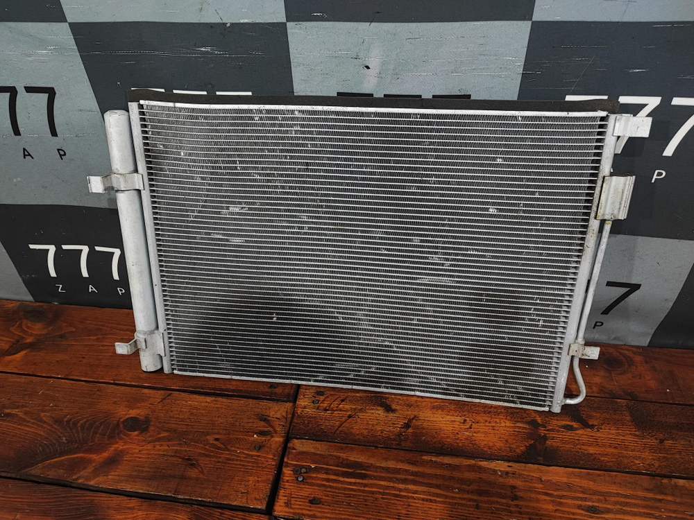 Радиатор кондиционера Solaris 1 / Rio 3 Б/У Оригинал 976061R000