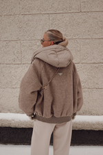 Пуховик средней длины из шерсти с капюшоном