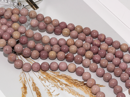 Нить бусин из родонита 10,5мм