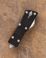 Автоматический складной нож Microtech Mini Troodon Black Hellhound VG-10 819-10S (черный) фронталка/выкидуха