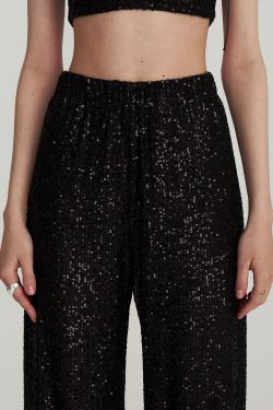 Брюки с пайетками черного цвета