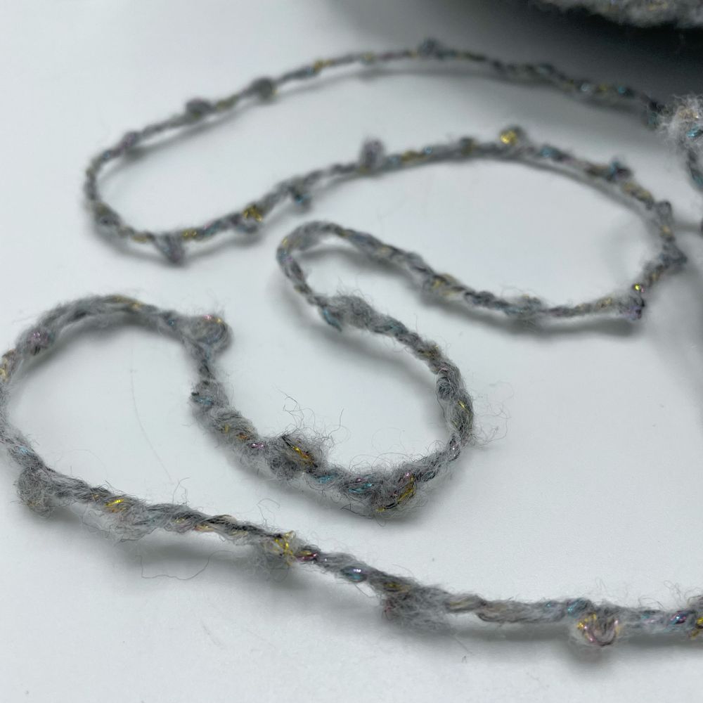 Букле COFIL 17% меринос 45% полиамид 34% полиэстер 2% люрекс