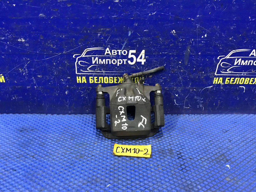 Суппорт тормозной передний левый TOYOTA IPSUM 1997