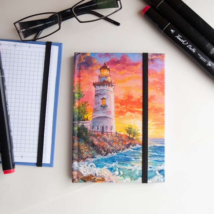 Блокнот А6 в клеточку Маяк на закате