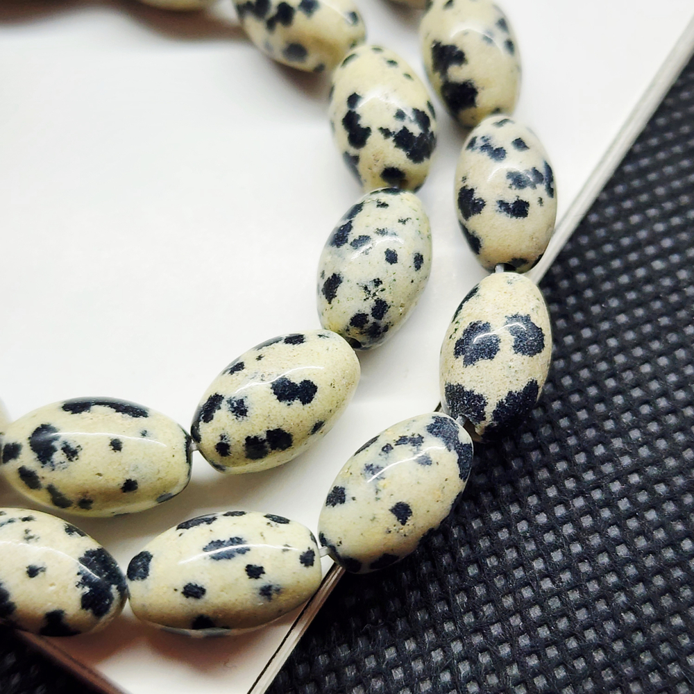 Порфир (яшма далматиновая), бусины овальные 12×8мм