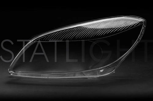 Левое стекло фары Skoda Fabia 2010-2014