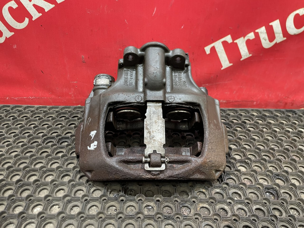 Суппорт задний левый