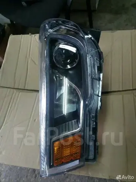 Фара левая x70 ORIGINAL,Б/у