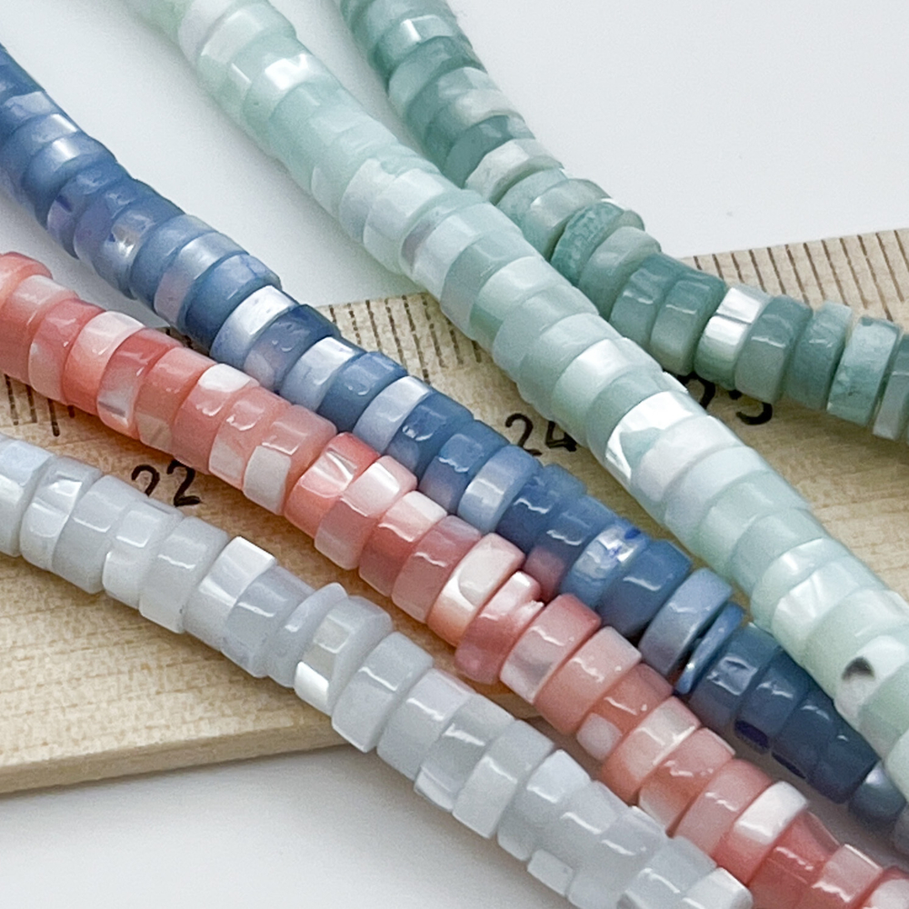 Перламутр тонированный, цвет розовый, размер около 5*2 мм, цена за 83-84 шт (1/2 нити)