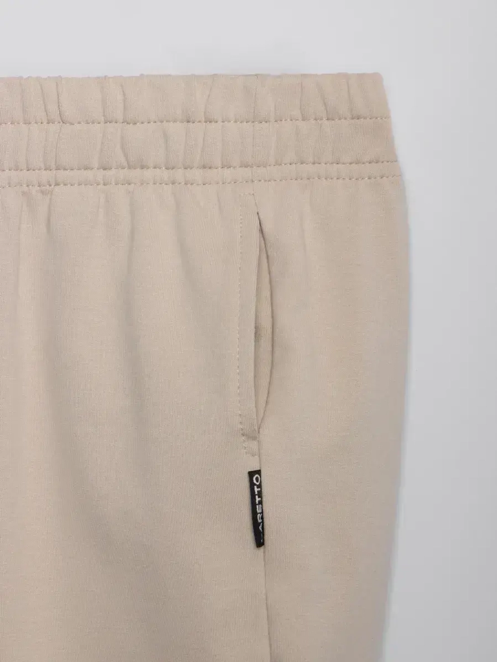 Бежевые брюки для девочки на осень