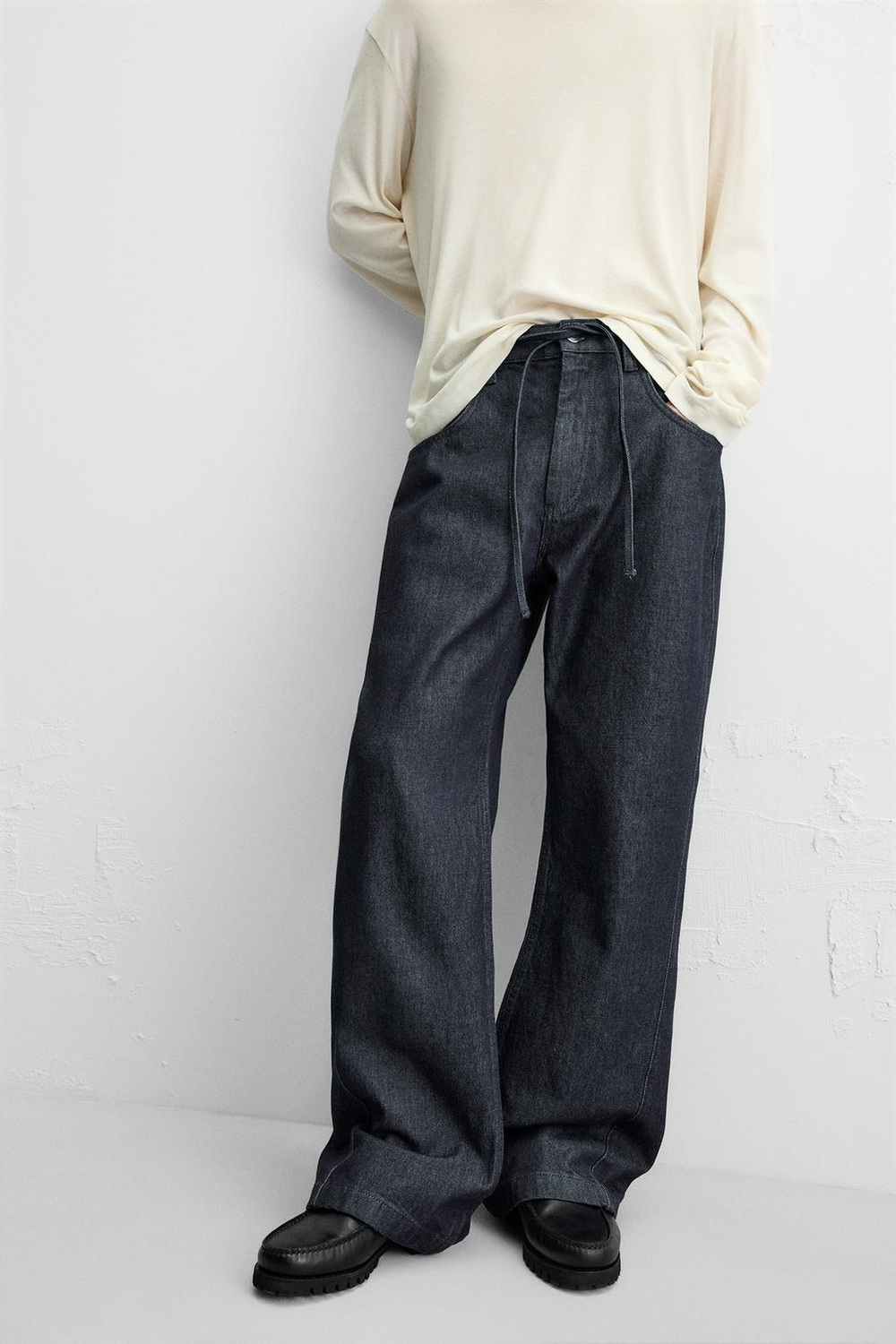 Джинсы flared fit