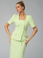 Женский салатовый костюм двойка с юбкой миди и разрезом
